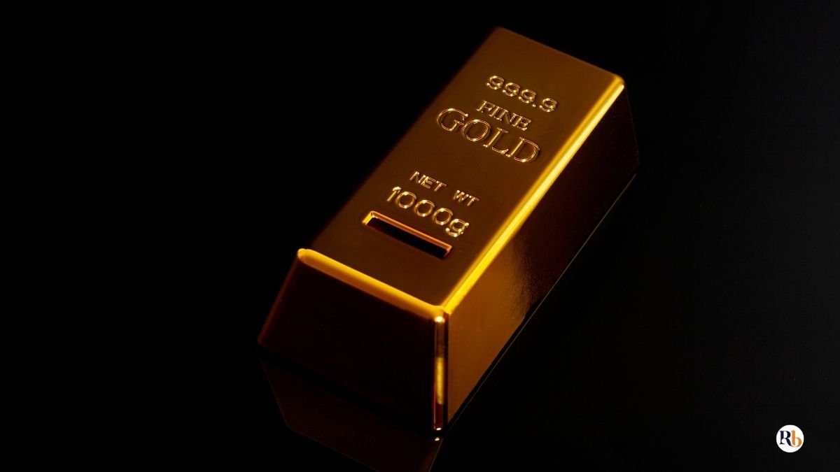 Barra de ouro ilustrando por que ouro é um ativo de proteção em períodos de crise econômica e instabilidade financeira.